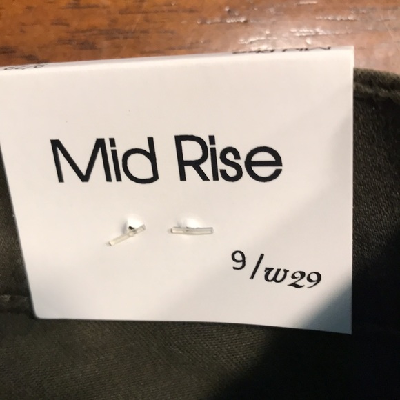 Sneak Peek Mid Rise Skinny Jeans - Picture 7 of 13